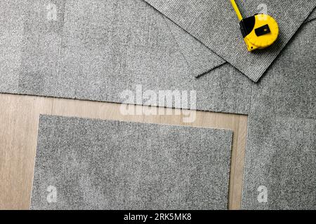 self adhesive carpet tile installation Stock Photo