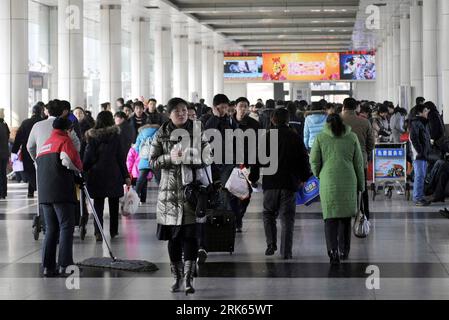 Bildnummer: 53802390  Datum: 17.02.2010  Copyright: imago/Xinhua (100217) -- JINAN, Feb. 17, 2010 (Xinhua) -- wait for their buses at a long-distance bus station in Jinan, capital of east China s Shandong Province, Feb. 17, 2010. Jinan met its medium and short-distance Spring Festival travel peak on Wednesday with most of the travelers going by long-distance buses to visit their relatives.(Xinhua/Zhu Zheng)(dyw) (4)CHINA-JINAN-SPRING FESTIVAL-TRAVEL (CN) PUBLICATIONxNOTxINxCHN Busbahnhof Bahnhof Bus Transport kbdig xdp 2010 quer     Bildnummer 53802390 Date 17 02 2010 Copyright Imago XINHUA 10 Stock Photo