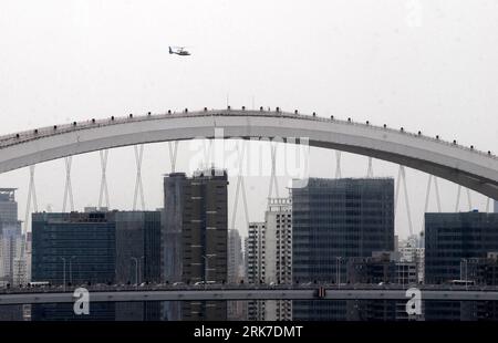 Bildnummer: 53903734  Datum: 29.03.2010  Copyright: imago/Xinhua (100330) -- SHANGHAI, March 30, 2010 (Xinhua) -- A police helicopter patrols over the Lupu Bridge bestride the World Expo Park in Shanghai, east China, March 29, 2010. The police helicopters will serve during 2010 World Expo. (Xinhua) (ly) CHINA-SHANGHAI-WORLD EXPO-SECURITY (CN) PUBLICATIONxNOTxINxCHN Polizei Weltausstellung Hubschrauber Polizeihubschrauber Sicherheit kbdig xsk 2010 quer o0 Brücke    Bildnummer 53903734 Date 29 03 2010 Copyright Imago XINHUA  Shanghai March 30 2010 XINHUA a Police Helicopter Patrol Over The Lupu Stock Photo