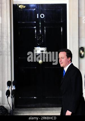 Bildnummer: 54041115  Datum: 11.05.2010  Copyright: imago/Xinhua (100511) -- LONDON, May 11, 2010 (Xinhua) -- Britain s new Prime Minister Conservative party leader David Cameron prepares to speak in front of 10 Downing Street in London, on May 11, 2010. Cameron was appointed as new prime minister. (Xinhua/Zeng Yi) (zw) (9)BRITAIN-LONDON-CAMERON-NEW PRIME MINISTER PUBLICATIONxNOTxINxCHN People Politik kbdig xdp 2010 hoch    Bildnummer 54041115 Date 11 05 2010 Copyright Imago XINHUA  London May 11 2010 XINHUA Britain S New Prime Ministers Conservative Party Leader David Cameron Prepares to spea Stock Photo