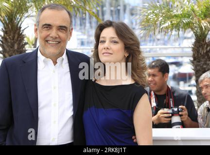 Bildnummer: 54043911  Datum: 12.05.2010  Copyright: imago/Xinhua (100512) -- CANNES, May 12, 2010 (Xinhua) -- Italian actress Giovanna Mezzogiorno (R) poses with Head of Italy s national film museum Alberto Barbera during the photocall of the members of the jury at the 63rd Cannes Film Festival in Cannes, France, on May 12, 2010. (Xinhua/Zhang Yuwei) (cl) (16)FRANCE-CANNES-FILM FESTIVAL PUBLICATIONxNOTxINxCHN People Kultur Entertainment Film 63. Internationale Filmfestspiele Filmfestival Photocall kbdig xmk 2010 quer     Bildnummer 54043911 Date 12 05 2010 Copyright Imago XINHUA  Cannes May 12 Stock Photo