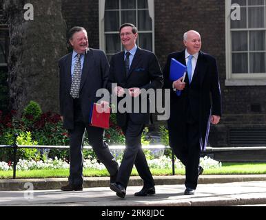 Bildnummer: 54044756  Datum: 13.05.2010  Copyright: imago/Xinhua (100513) -- LONDON, May 13, 2010 (Xinhua) -- Britain s new Lord Chancellor and Secretary of State for Justice Ken Clarke, Attorney General Dominic Grieve and Work and Pensions Secretary Iain Duncan Smith (from left to right) arrive at No. 10 Downing Street in London, Britain, May 13, 2010. The new British Prime Minister held the first cabinet meeting of his Conservatives-Lib-Dem coalition goverment Thursday morning. (Xinhua/Zeng Yi)(zl) (6)BRITAIN-CAMERON-FIRST CABINET MEETING PUBLICATIONxNOTxINxCHN People Politik Kabinett premiu Stock Photo