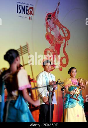 Bildnummer: 54272163  Datum: 03.08.2010  Copyright: imago/Xinhua (100803) -- BEIJING, Aug. 3, 2010 (Xinhua) -- The Music House Angklung Ensemble from Philippines perform at a concert during the 29th world music education conference in Beijing, capital city of China, Aug. 3, 2010. Angklung, a traditional musical instrument made of bamboo, is popular throughout Southeast Asia. (Xinhua/Luo Xiaoguang) (zf) (3)CHINA-BEIJING-ISME WORLD CONFERENCE-ANGKLUNG(CN) PUBLICATIONxNOTxINxCHN Musik Kultur kbdig xsk 2010 hoch o0 People Aktion    Bildnummer 54272163 Date 03 08 2010 Copyright Imago XINHUA  Beijin Stock Photo