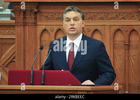 Bildnummer: 54544949  Datum: 18.10.2010  Copyright: imago/Xinhua (101018) -- BUDAPEST, Oct. 18, 2010 (Xinhua) -- Hungarian Prime Minister Viktor Orban addresses the Parliament in Budapest, capital of Hungary, on Oct. 18, 2010. The main task of the Hungarian government is to enforce the public interest and drive all private interests out of the public sector, said Orban while announcing his second action plan. (Xinhua/Dani Dorko) (zw) HUNGARY-BUDAPEST-ACTION PLAN PUBLICATIONxNOTxINxCHN People Politik premiumd kbdig xkg 2010 quer     Bildnummer 54544949 Date 18 10 2010 Copyright Imago XINHUA  Bu Stock Photo