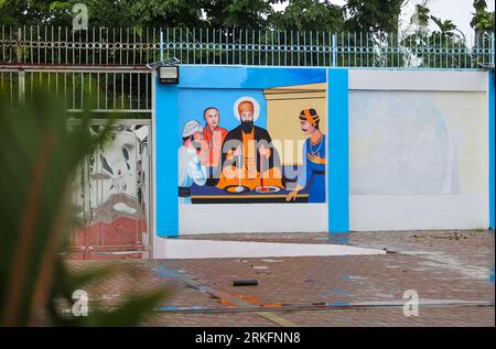 Fresque murale dans le temple sikh indien Sat Kartar, communauté philippine indienne philippine, San Pablo Laguna, symboles sikhs Gurdwara, Philippines Banque D'Images