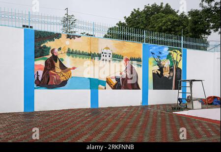 Fresque murale dans le temple sikh indien Sat Kartar, communauté philippine indienne philippine, San Pablo Laguna, symboles sikhs Gurdwara, Philippines Banque D'Images