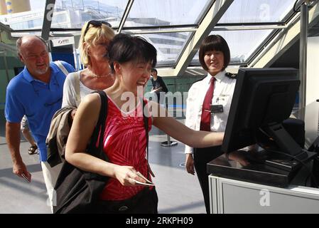 Bildnummer: 57995660  Datum: 16.05.2012  Copyright: imago/Xinhua (120516) -- SHANGHAI, May 16, 2012 (Xinhua) -- Tourists go through entry procedures after leaving Costa Victoria, a cruise ship owned by Costa Cruises, at Wusongkou International Cruise Port (WICP) in east China s Shanghai Municipality, May 16, 2012. Costa Victoria will be the first overseas cruise ship to use WICP as its home port since WICP officially began its service on October 15, 2011. (Xinhua/Pei Xin) (lmm) CHINA-SHANGHAI-WUSONGKOU INTERNATIONAL CRUISE PORT-COSTA VICTORIA-ARRIVAL (CN) PUBLICATIONxNOTxINxCHN Wirtschaft Tran Stock Photo