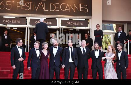 Bildnummer: 58006908  Datum: 19.05.2012  Copyright: imago/Xinhua (120519) -- CANNES, May 19, 2012 (Xinhua) -- Cast members attend the premiere for the American film Lawless at the 65th Cannes Film Festival, southern France, May 19, 2012. (Xinhua/Gao Jing) FRANCE-CANNES-FILM FESTIVAL-LAWLESS-PREMIERE PUBLICATIONxNOTxINxCHN Kultur Entertainment People Film 65. Internationale Filmfestspiele Cannes Filmpremiere premiumd xsp x0x 2012 quer      58006908 Date 19 05 2012 Copyright Imago XINHUA  Cannes May 19 2012 XINHUA Cast Members attend The Premiere for The American Film Lawless AT The 65th Cannes Stock Photo