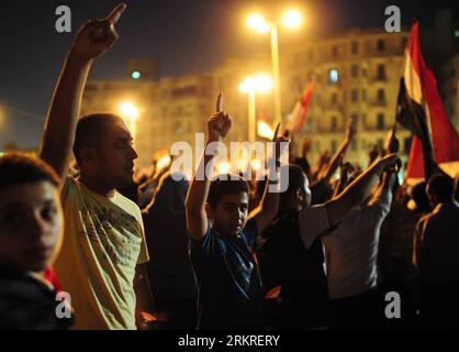 Bildnummer: 58221599  Datum: 10.07.2012  Copyright: imago/Xinhua (120710) -- CAIRO, July 10, 2012 (Xinhua) -- Egyptians participate in a rally to support the newly-elected Egypt s President Mohamed Morsi at Cairo s Tahrir Square in Egypt, July 10, 2012. Egypt s Supreme Constitutional Court on Tuesday suspended a presidential decree reinstating the dissolved People s Assembly (lower house of parliament). (Xinhua/Qin Haishi) EGYPT-CAIRO-POLITICS-PARLIAMENT-RALLY PUBLICATIONxNOTxINxCHN Politik Demo Protest xjh x0x 2012 quer      58221599 Date 10 07 2012 Copyright Imago XINHUA  Cairo July 10 2012 Stock Photo