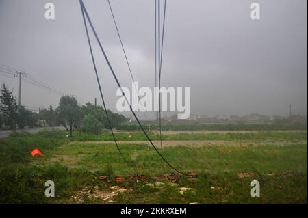 Bildnummer: 58324715  Datum: 08.08.2012  Copyright: imago/Xinhua (120808) -- XIANGSHAN, Aug. 8, 2012 (Xinhua) -- Telegraph poles are blown down and farmlands are flooded in the typhoon-hit Hepu Township of Xiangshan County, east China s Zhejiang Province, Aug. 8, 2012. Typhoon Haikui landed in Hepu Township early Wednesday. (Xinhua/Huang Zongzhi) (ry) CHINA-ZHEJIANG-TYPHOON HAIKUI-LANDFALL (CN) PUBLICATIONxNOTxINxCHN Gesellschaft Unwetter Sturm Schäden xbs x0x 2012 quer      58324715 Date 08 08 2012 Copyright Imago XINHUA  Xiang Shan Aug 8 2012 XINHUA Telegraph Poles are blown Down and Farm co Stock Photo