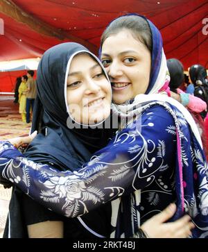 Bildnummer: 58366671  Datum: 20.08.2012  Copyright: imago/Xinhua (120820) -- LAHORE, Aug. 20, 2012 (Xinhua) -- Pakistani Muslim women hug after Eid al-Fitr prayer at the historical Badshahi Masjid Mosque in Lahore, eastern Pakistan, Aug. 20, 2012. Millions of Muslims across Asia began celebrating the Eid al-Fitr festival on Aug. 19, with feasting, family reunions and festivities. (Xinhua/Sajjad) (psw) PAKISTAN-LAHORE-EID-AL-FITR PUBLICATIONxNOTxINxCHN Gesellschaft Religion Islam x0x xst 2012 quadrat Highlight premiumd      58366671 Date 20 08 2012 Copyright Imago XINHUA  Lahore Aug 20 2012 XIN Stock Photo
