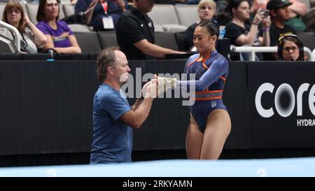 August 25, 2023: Olympic gold medalist Sunisa Lee celebrates with her coach Jess Graba after her vault during the senior women day 1 competition at the 2023 U.S. Gymnastics Championships. The competition is being held at the SAP Center in San Jose, California. Melissa J. Perenson/CSM Stock Photo