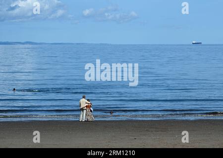 Édimbourg, Écosse, Royaume-Uni. 26 août 2023. Trouver un moment calme sur la plage de Portobello. Un endroit calme sur la plage. Crédit : Craig Brown/Alamy Live News Banque D'Images
