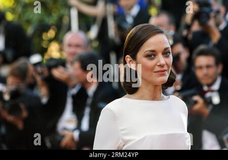Bildnummer: 59698146  Datum: 24.05.2013  Copyright: imago/Xinhua (130524) -- CANNES, May 24, 2012 (Xinhua) -- French actress Marion Cotillard attends the premiere of The Immigrant at the 66th Cannes Film Festival in Cannes, southern France, May 24, 2013. (Xinhua/Zhou Lei) FRANCE-CANNES-FILM FESTIVAL-COMPETITION-THE IMMIGRANT PUBLICATIONxNOTxINxCHN People Kultur Entertainment Film 66 Internationale Filmfestspiele Cannes Filmpremiere Premiere Porträt xdp x1x 2013 quer Highlight premiumd      59698146 Date 24 05 2013 Copyright Imago XINHUA  Cannes May 24 2012 XINHUA French actress Marion Cotillar Stock Photo