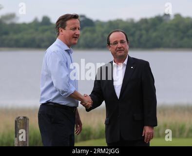 Bildnummer: 59847585  Datum: 17.06.2013  Copyright: imago/Xinhua (130618) -- FERMANAGH,  2013 (Xinhua) -- Britain s Prime Minister David Cameron (L) shakes hands with French President Francois Hollande during the official welcome as world leaders arrive for the openning ceremony of the G8 Summit at the Lough Erne resort near Enniskillen in Northern Ireland June 17, 2013. The focus of the Group of Eight (G8) industrialized nations annual summit were expected to be on Syria and economic issues. (Xinhua/Yin Gang) UK-G8-SUMMIT-OPENING PUBLICATIONxNOTxINxCHN People Politik G8 G 8 Gipfel Nordirland Stock Photo