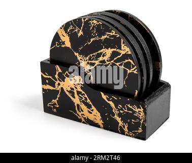 Support avec dessous de verre de table élégants sur fond blanc Banque D'Images