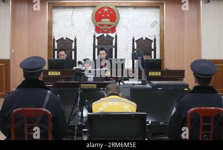 (140120) -- SHIJIAZHUANG, 20 janvier 2014 (Xinhua) -- Lyu Yueting assiste à son procès devant le tribunal populaire intermédiaire municipal de Shijiazhuang à Shijiazhuang, capitale de la province du Hebei du nord de la Chine, le 20 janvier 2014. LYU a été condamné à la prison à vie pour avoir ajouté du poison à des boulettes congelées qui ont laissé malades quatre Chinois et neuf Japonais. Le tribunal populaire intermédiaire municipal de Shijiazhuang a rendu le verdict lundi lors d'une audience publique en présence de journalistes et de fonctionnaires de l'ambassade du Japon en Chine. (Xinhua/Ding Lixin) (lmm) CHINA-SHIJIAZHUANG-DUMPLING EMPOISONNEMENT C Banque D'Images