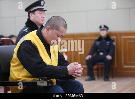 (140120) -- SHIJIAZHUANG, 20 janvier 2014 (Xinhua) -- Lyu Yueting assiste à son procès devant le tribunal populaire intermédiaire municipal de Shijiazhuang à Shijiazhuang, capitale de la province du Hebei du nord de la Chine, le 20 janvier 2014. LYU a été condamné à la prison à vie pour avoir ajouté du poison à des boulettes congelées qui ont laissé malades quatre Chinois et neuf Japonais. Le tribunal populaire intermédiaire municipal de Shijiazhuang a rendu le verdict lundi lors d'une audience publique en présence de journalistes et de fonctionnaires de l'ambassade du Japon en Chine. (Xinhua/Ding Lixin) (lmm) CHINA-SHIJIAZHUANG-DUMPLING EMPOISONNEMENT C Banque D'Images