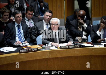 (140129) -- New York, 29 janv. 2014 (Xinhua) -- Vitaly Churkin (C), représentant permanent de la Russie auprès des Nations Unies, prend la parole lors d'un débat public du Conseil de sécurité sur la guerre, ses leçons et la recherche d'une paix permanente , au siège de l'ONU à New York, le 29 janvier 2014. La Chine, la Corée du Sud et la République populaire démocratique de Corée (RPDC) ont salué la récente visite du Premier ministre japonais Shinzo Abe au tristement célèbre sanctuaire Yasukuni lors du débat public du Conseil de sécurité de l'ONU mercredi. (Xinhua/Niu Xiaolei) (lyx) un-NEW YORK-OPEN DEBATE-VISITE DU SANCTUAIRE ABE S PUBLICATIONxNOTxINxCHN New Y. Banque D'Images