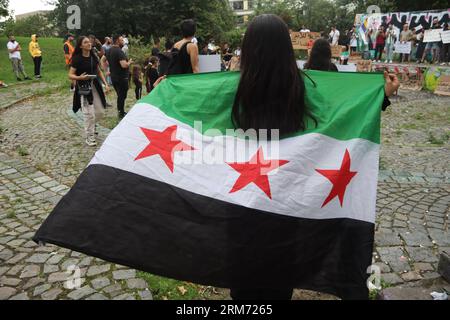 Les manifestations syriennes à Leipzig en Allemagne condamnent les actions du régime. Soutenez le mouvement populaire dans le sud de la Syrie, en mettant l'accent sur Suwayda Banque D'Images