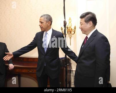 (140324) -- LA HAYE, 24 mars 2014 (Xinhua) -- le président chinois Xi Jinping (R) rencontre le président américain Barack Obama à la Haye, pays-Bas, le 24 mars 2014. (Xinhua/LAN Hongguang) (zkr) NETHERLANDS-CHINA-XI JINPING-U.S.-OBAMA-MEETING PUBLICATIONxNOTxINxCHN la Haye Mars 24 2014 le président chinois Xi Jinping r rencontre le président américain Barack Obama à la Haye pays-Bas Mars 24 2014 XINHUA LAN Hongguang CCR pays-Bas Chine Xi Jinping U S Obama Meeting PUBLICATIONxNOTxINxINxCHN Banque D'Images