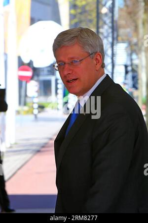 (140324) -- LA HAYE, le 24 mars 2014 (Xinhua) -- le Premier ministre canadien Stephen Harper arrive à la Haye, aux pays-Bas, pour le troisième Sommet sur la sécurité nucléaire (SNRS), le 24 mars 2014. Le troisième Sommet sur la sécurité nucléaire (SNRS) a débuté ici lundi, dans le but de prévenir le terrorisme nucléaire dans le monde entier. (Xinhua/Gong Bing) PAYS-BAS-LA HAYE-SOMMET NUCLÉAIRE PUBLICATIONxNOTxINxCHN la Haye Mars 24 2014 le Premier ministre canadien XINHUA Stephen Harper arrive pour le troisième Sommet sur la sécurité nucléaire à la Haye aux pays-Bas LE 24 2014 mars le troisième Sommet sur la sécurité nucléaire Banque D'Images