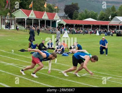 Coureurs participant au Braemar Gathering, Highland Games. Aberdeenshire. Banque D'Images