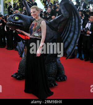 (140516) -- CANNES, (Xinhua) -- l'actrice australienne Cate Blanchett arrive pour la première de How to train Your Dragon 2 lors du 67e Festival de Cannes, à Cannes, France, le 15 mai 2014. (Xinhua/Chen Xiaowei) FRANCE-CANNES-FESTIVAL-COMMENT FORMER SON DRAGON 2-PREMIERE PUBLICATIONxNOTxINxCHN Cannes XINHUA l'actrice australienne Cate Blanchett arrive pour la première de How to train Your Dragon 2 au 67e Festival de Cannes France 15 2014 mai XINHUA Chen Xiaowei France Festival de Cannes Comment former son Dragon 2 Premiere PUBLICATIONxNOTxINxCHN Banque D'Images