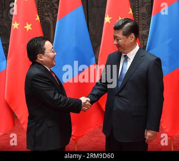 (140519) -- SHANGHAI, 19 mai 2014 (Xinhua) -- le président chinois Xi Jinping (R) rencontre son homologue mongol Tsakhiagiin Elbegdorj à Shanghai, dans l'est de la Chine, le 19 mai 2014. (Xinhua/Ma Zhancheng) (lfj) CHINA-SHANGHAI-XI JINPING-MONGOLIAN PRESIDENT-MEETING (CN) PUBLICATIONxNOTxINxCHN Shanghai Mai 19 2014 XINHUA Chinese President Xi Jinping rencontre avec sa partie mongole Tsakhiagiin Elbegdorj à Shanghai East China May 19 2014 XBLICATIONXNOTXIONN President Banque D'Images