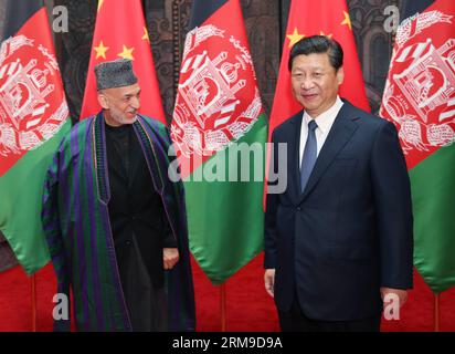 (140519) -- SHANGHAI, 19 mai 2014 (Xinhua) -- le président chinois Xi Jinping (R) rencontre le président afghan Hamid Karzaï à Shanghai, dans l'est de la Chine, le 19 mai 2014. (Xinhua/Yao Dawei) (mp) CHINA-SHANGHAI-XI JINPING-AFGHANISTAN-KARZAI-MEETING (CN) PUBLICATIONxNOTxINxCHN Shanghai mai 19 2014 le président chinois Xi Jinping r rencontre le président afghan Hamid Karzai à Shanghai East China mai 19 2014 XINHUA Yao Dawei MP China Shanghai Xi Jinping Afghanistan Karzai Meeting CN PUBLICATIONXNOTXINCHINXINXINXN Banque D'Images