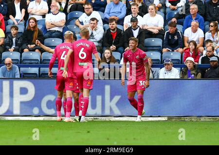 Deepdale Stadium, Preston, England - 26th August 2023 Harrison Ashby (30) of Swansea City celebrates with team mates after scoring the 1st goal - during the game Preston NE v Swansea City, EFL Championship, 2023/24, Deepdale Stadium, Preston, England - 26th August 2023  Credit: Arthur Haigh/WhiteRosePhotos/Alamy Live News Stock Photo