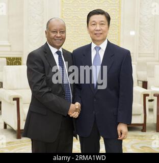 (140610) -- PÉKIN, 10 juin 2014 (Xinhua) -- le vice-président chinois Li Yuanchao (à droite) rencontre une délégation du Front démocratique révolutionnaire du peuple éthiopien (FDRPE) dirigée par Abay Tsehaye à Pékin, capitale de la Chine, le 10 juin 2014. (Xinhua/Huang Jingwen) (zkr) CHINA-LI YUANCHAO-ETHIOPIA-EPRDF-DELEGATION-MEETING (CN) PUBLICATIONxNOTxINxCHN Beijing juin 10 2014 le vice-président chinois de XINHUA 10 2014 a quitté Yuan Chao r Banque D'Images