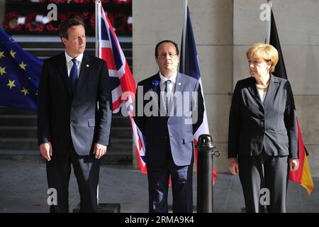 (140626) -- BRUXELLES, 26 juin 2014 (Xinhua) -- le Premier ministre britannique David Cameron, le président français François Hollande, la chancelière allemande Angela Merkel (de gauche à droite) assistent à une cérémonie marquant le centenaire du déclenchement de la première Guerre mondiale, à Ypres, au nord-ouest de la Belgique, le 26 juin 2014. Pendant la guerre, des centaines de milliers de soldats et de civils du monde entier ont perdu la vie autour de la ville belge d'Ypres. Jeudi, les dirigeants de l'UE entament un sommet de deux jours ici, l'un des champs de bataille les plus meurtriers de la première Guerre mondiale. (Xinhua/Ye Pingfan) BELGIQUE-IEPER-UE-SOMMET-PREMIÈRE GUERRE MONDIALE ANNIVERSA Banque D'Images