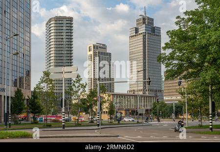 Amsterdam, The Netherlands, 24.08.2023, Traffic around Amstel train station with the view on Rembrandt Tower office skyscraper Stock Photo