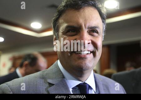 (140804) -- SAO PAULO, 4 août 2014 -- Aecio Neves, candidat à la présidence du Parti social-démocratie brésilien (PSDB), réagit lors d'une conférence sur l'agro-industrie à Sao Paulo, Brésil, le 4 août 2014. Aecio Neves est le principal candidat de l'opposition opposé à la présidente brésilienne sortante Dilma Rousseff, également candidate à la présidence du Parti des travailleurs (PT), lors des élections présidentielles d'octobre au Brésil. (jp) (ah) BRÉSIL-SAO PAULO-POLITICS-ELECTIONS-CANDIDATE e RahelxPatrasso PUBLICATIONxNOTxINxCHN Sao Paulo août 4 2014 Aecio Neves candidat à la présidence du Parti social-démocrate brésilien PSDB Banque D'Images