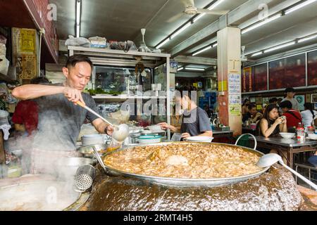 Bangkok, Thailand - August 27, 2023 : Thai local street food. chef cooking Thai style beef noodle soup in small restaurant at Bangkok, Thailand. Trave Stock Photo