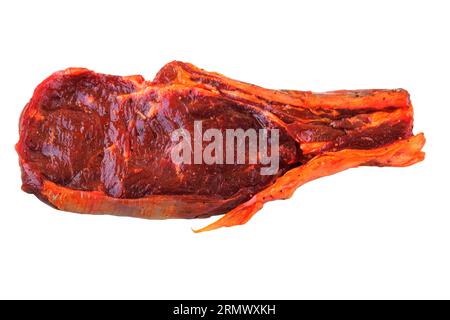 Marinated ribeye in spicy red sauce. Isolate on a white background. Stock Photo