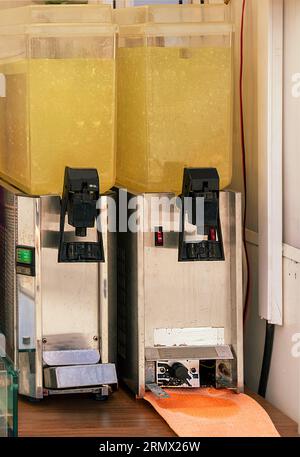 Lemonade suspensers machines selling cold refreshing drink on a local market fair Stock Photo