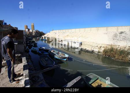 (150202) -- ALEXANDRIE, 2 février 2015 -- la photo prise le 30 janvier 2015 montre une vue générale d'un canal dans la ville de pêcheurs El Max à Alexandrie, en Égypte. La ville de pêcheurs connue sous le nom de Venise en Egypte est située près de la ville côtière méditerranéenne Alexandrie, et les pêcheurs ici vivent de la pêche d'une génération à l'autre.) EGYPT-ALEXANDRIA-FISH-EL MAX-FEATURE AhmedxGomaa PUBLICATIONxNOTxINxCHN Alexandrie février 2 2015 photo prise LE 30 2015 janvier montre une vue générale d'un canal À la ville de Fisher El Max à Alexandrie Egypte la ville de Fisher connue sous le nom de Venise en Egypte EST située près de la côte méditerranéenne ci Banque D'Images