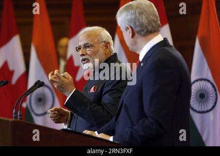 (150415) -- OTTAWA, le 15 avril 2015 -- le premier ministre canadien Stephen Harper(R) et le premier ministre indien Narendra Modi assistent à une conférence de presse conjointe sur la Colline du Parlement, à Ottawa, au Canada, le 15 avril 2015.) CANADA-OTTAWA-PM-MEETING DavidxKawai PUBLICATIONxNOTxINxCHN Ottawa avril 15 2015 les premiers ministres canadiens Stephen Harper et Narendra modes participent à une conférence de presse conjointe SUR la Colline du Parlement à Ottawa Canada LE 15 2015 avril Canada Ottawa PM Meeting PUBLICATIONxNOTxINxCHN Banque D'Images