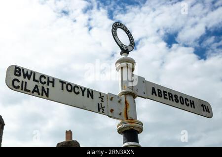 An old metal sign post pointing to Abersoch Stock Photo