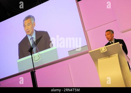 (150529) -- SINGAPOUR, le 29 mai 2015 -- le Premier ministre de Singapour, Lee Hsien Loong, prononce un discours liminaire lors du dîner d'ouverture du dialogue Shangril-la, à Singapour, le 29 mai 2015. Le 14e dialogue Shangri-la, largement reconnu comme le plus important sommet de défense et de sécurité de la région Asie-Pacifique, a débuté vendredi à Singapour. (lrz) SINGAPOUR-14E DIALOGUE SHANGRI-LA ThenxChihxWey PUBLICATIONxNOTxINxCHN 150529 Singapour Mai 29 2015 Singapour les premiers ministres Lee Hsien Loong prononce un discours liminaire au dîner d'ouverture du dialogue la à Singapour 29 2015 Mai 14e dialogue Shangri la Banque D'Images