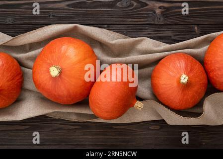 Harvest Red Kuri Squash or Hokkaido Pumpkin Stock Photo