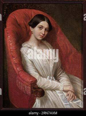 Fille en fauteuil rouge. 1846 par Jan Ksawery Kaniewski Banque D'Images