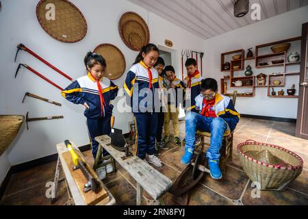 (151022) -- CHANGXING, Oct. 22, 2015 -- Pupils in Baixian primary school learn to process herbal medicine in Changxing County, east China s Zhejiang Province. Located in a mountain village, Baixian primary school grows over 130 kinds of herbal medicine in its 5,000 square meters garden, characterizing herbal medicine in education. ) (dhf) CHINA-ZHEJIANG-PRIMARY SCHOOL-HERBAL MEDICINE EDUCATION (CN) XuxYu PUBLICATIONxNOTxINxCHN   Chang Xing OCT 22 2015 Pupils in  Primary School Learn to Process Herbal Medicine in Chang Xing County East China S Zhejiang Province Located in a Mountain Village  Pr Stock Photo