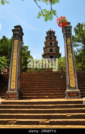 (151101) -- HANOI, Nov. 1, 2015 -- Photo taken on April 28, 2013 shows the Celestial Lady Pagoda among the Complex of Hue Monuments heritage site located in Hue of central Vietnam. So far, five cultural sites, namely Central Sector of the Imperial Citadel of Thang Long - Hanoi, Citadel of the Ho Dynasty, Complex of Hue Monuments, Hoi An Ancient Town, My Son Sanctuary, and one mixed site of Trang An Landscape Complex in Vietnam have been inscribed in the list of world heritages by UNESCO. ) VIETNAM-WORLD HERITAGE SITES ZhangxJianhua PUBLICATIONxNOTxINxCHN   Hanoi Nov 1 2015 Photo Taken ON April Stock Photo