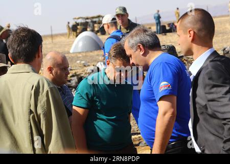 (151101) -- ARISH CITY, Nov. 1, 2015 -- Russian Transport Minister Maxim Sokolov (3rd R) talks with Puchkov Vladimir Andreevich (2nd R), Russian minister for Civil Defense, Emergencies and Natural Disasters, at the crash site of a Russian passenger airplane which crashed at the Hassana area in Arish city, north Egypt, on Nov. 1, 2015. Egyptian and international investigators on Sunday have begun probing the reasons of the Russian plane that crashed in Egypt s Sinai peninsula on Saturday which killed all 224 on board. ) EGYPT-RUSSIA-TRANSPORT MINISTER-PLANE-CRASH-INVESTIGATION AhmedxGomaa PUBLI Stock Photo