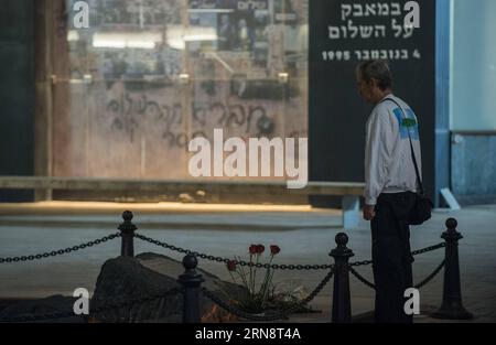 (151105) -- TEL AVIV, Nov. 4, 2015 -- A man mourns at the site where former Israeli Prime Minister Yitzhak Rabin was assassinated, at the 20th anniversary of the assassination of Yitzhak Rabin, near the Rabin Square in Tel Aviv, Israel, Nov. 4, 2015. Rabin was assassinated on Nov. 4, 1995, at the end of a rally in support of the Oslo Accords at the Kings of Israel Square in Tel Aviv. ) ISRAEL-TEL AVIV-YITZHAK RABIN-ASSASSINATION-20TH ANNIVERSARY LixRui PUBLICATIONxNOTxINxCHN Gedenken an Jitzchak Rabin in Tel Aviv   Tel Aviv Nov 4 2015 a Man mourns AT The Site Where Former Israeli Prime Ministe Stock Photo