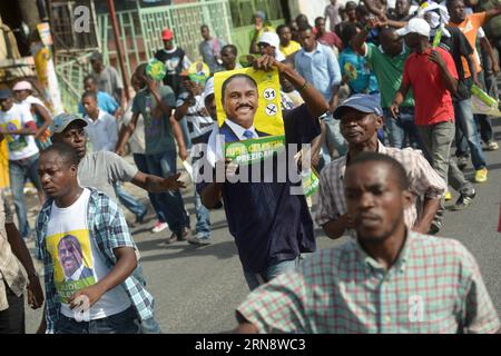 (151107) -- PORT-AU-PRINCE, Nov. 6, 2015 -- People take part in a rally against the results of the presidential elections in Port-Au-Prince, Haiti, on Nov. 6, 2015. Residents took to the streets of the Haitian capital on Friday to express rejection to the results of the last presidential elections, while the government reaffirmed its support to the electoral process and guaranteed that it will keep the order in the country. Supporters of Celestin and Jean-Charles, second and third according to the counting of the votes, marched in the Delmas municipality, northeast of Port-Au-Prince, where som Stock Photo
