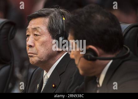 (151116) -- MANILA, Nov. 16, 2015 -- Japan s minister of economy Motoo Hayashi (L) attends the Asia-Pacific Economic Cooperation (APEC) Ministerial Meeting in Manila, the Philippines, on Nov. 16, 2015. Ministers from the APEC attached importance to inclusive growth and emphasized service sector s role in driving economic growth in the region. ) THE PHILIPPINES-MANILA-APEC-MINISTERIAL MEETING LuixSiuxWai PUBLICATIONxNOTxINxCHN   Manila Nov 16 2015 Japan S Ministers of Economy Motoo Hayashi l Attends The Asia Pacific Economic Cooperation APEC Ministerial Meeting in Manila The Philippines ON Nov Stock Photo